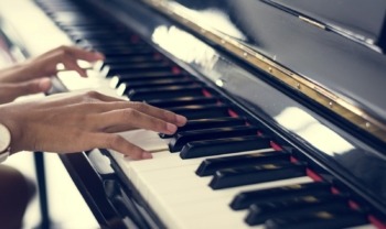 Woman playing on a piano