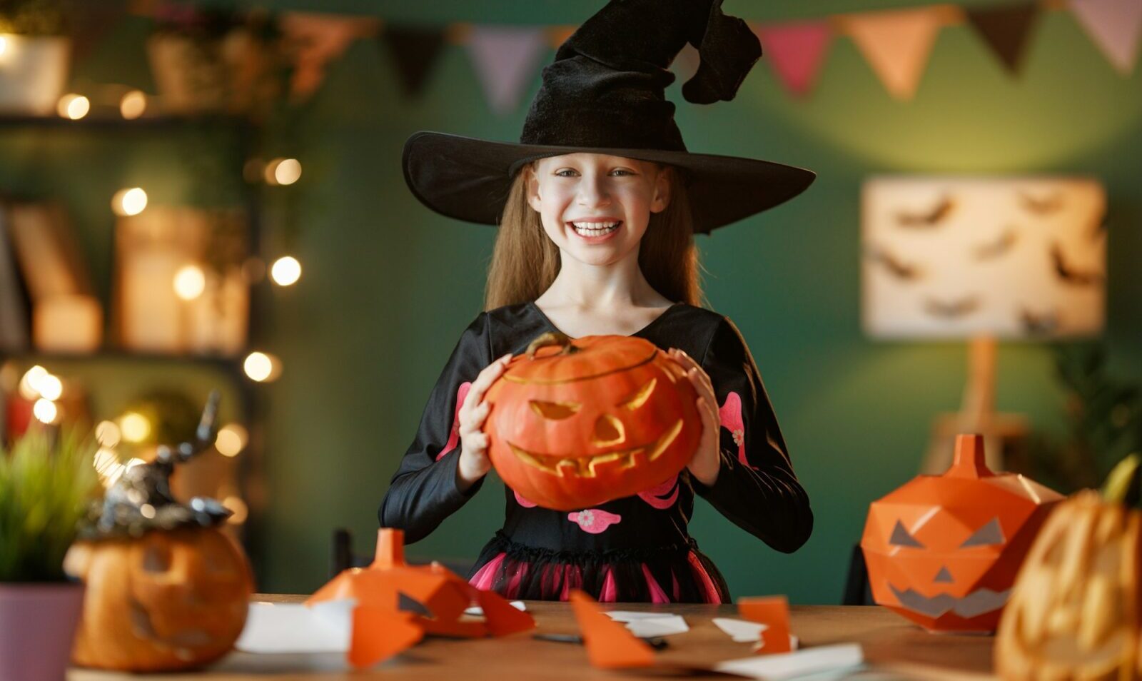 girl with Halloween pumpkins