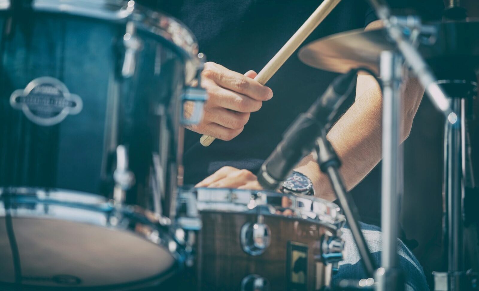 Man drumming, closeup shot of hands